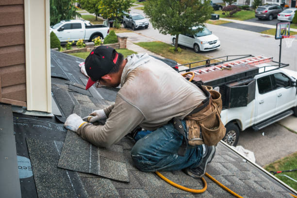 Professional Roof Replacement technician working in Tamiment, PA